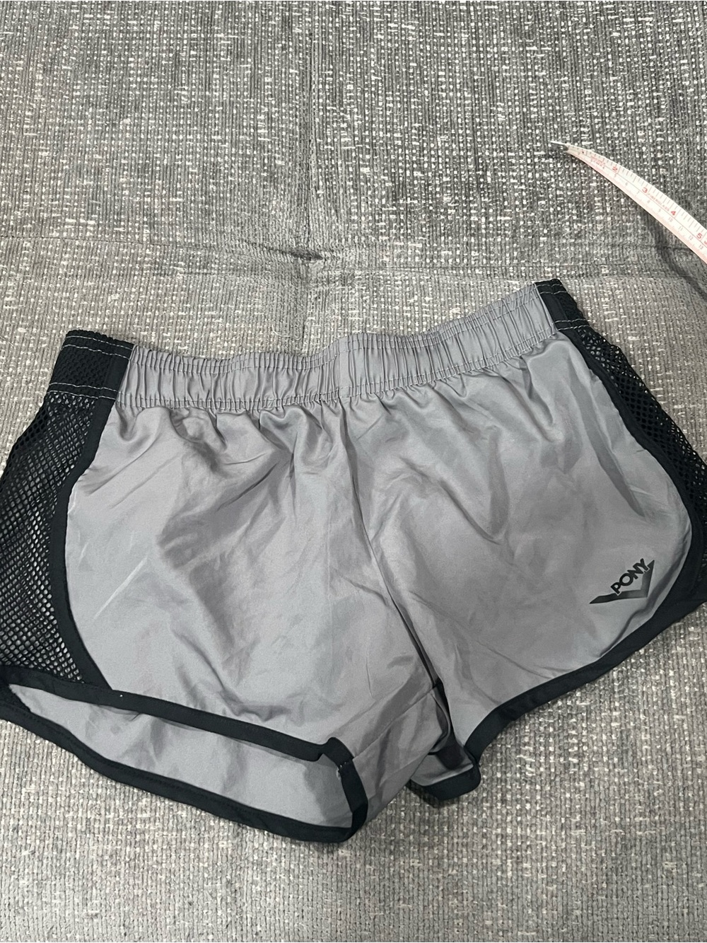 Pony Women’s Gray Athletic Shorts with Black Mesh Trim. L22